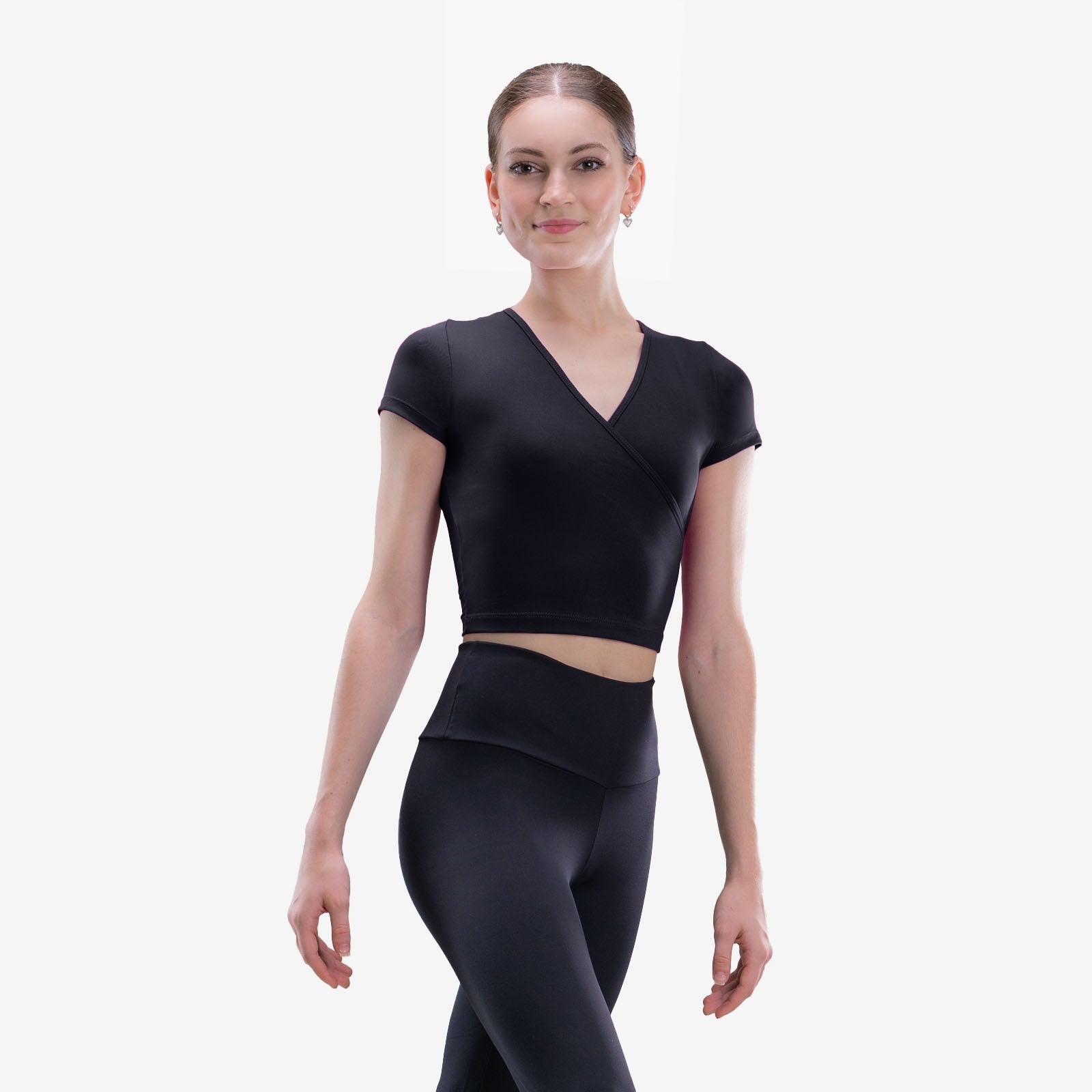 The Ember Top - SL205, Adult Mock Wrap Top with Short Sleeves is part of the Só Dança range of Shirts & Tops. See more details and sizing information here.