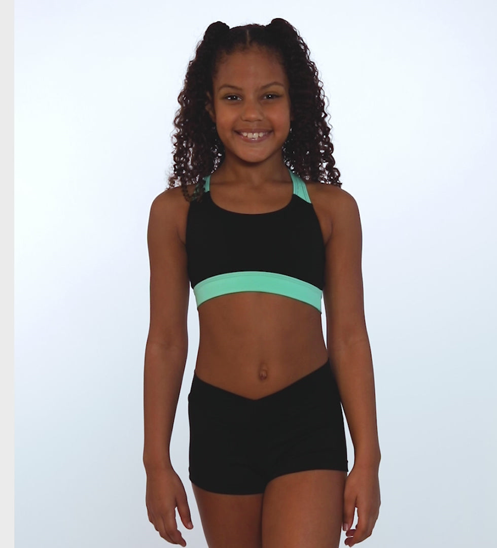 The Layla Kid's Top - SL144, Child Bralette Top with Criss-Cross Straps is part of the Só Dança range of Shirts & Tops. See more details and sizing information here.