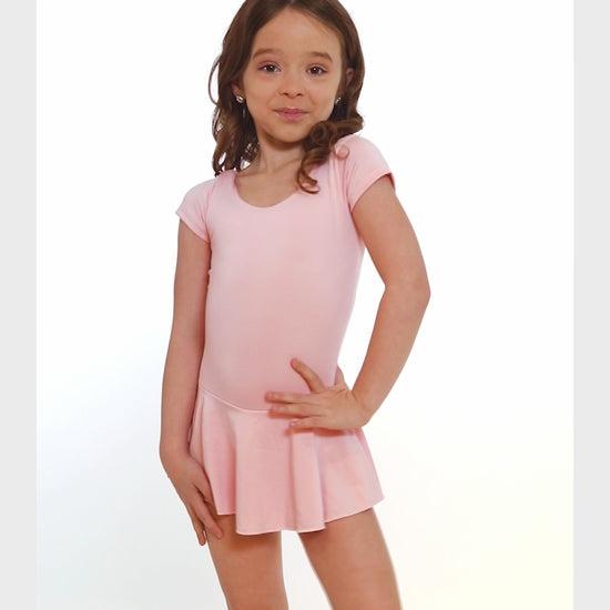 The Christabel - SL122, Child Cap Sleeve Dress Leotard with Bow on Back is part of the Só Dança range of Leotards & Unitards. See more details and sizing information here.