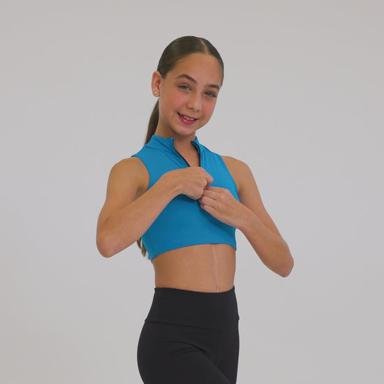 The Show Kid's Top - SL200, Child Mock Neck Top with 1/4 Zipper  is part of the Só Dança range of Shirts & Tops. See more details and sizing information here.